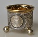 Swedish silver goblet in baroque form, 1951. On three ball feet. The side is decorated with ...