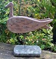 Decoy duck in painted wood, approx. 1920. Denmark. On foot. L.: 28 cm. H.: 32 cm.Great ...