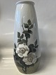 Royal Copenhagen Art Nouveau vase decorated with white roses. The vase is decorated all ...