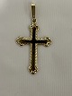 Cross pendant in 14 caratsStamp: 585.Height with eyelet: 4.3 cm.Width: 2.2 cm.Nice ...