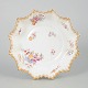 Rörstrand, bowl.Round porcelain bowl with a scalloped and gilt rim, decorated with polychrome ...