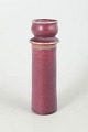 Royal Copenhagen ceramic candlestick with oxblood glaze.