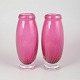 Pair of Chribska glass vases.Elegant set of two hand-blown pink art glass vases with baluster ...
