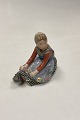 Royal Copenhagen Overglaze figurine of Flower Girl Jylland No. 12421. Measures 11cm x 9cm / ...
