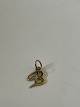 Beautiful pendant in 14 carat gold, shaped like the letter B with an inlaid diamond. Beautiful ...