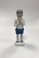 Bing and Grøndahl Figurine of the Boy Peter No. 1696. Designed by Ingeborg Plockross Irminger. ...