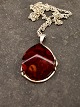Sterling silver pendant with amber