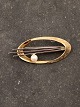 14 carat gold brooch 5 x 2.3 cm. weight 6.3 grams with genuine pearl from goldsmith Herman ...