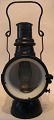 Train lamp, 19th century. Black painted with glass. With a handle. Height with handle: 48 cm. ...