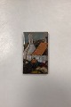 Nis Stougaard Ceramic Relief. Motif of fishermen and smokehouse from Svaneke, Bornholm in glazed ...