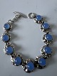 Bracelet with blue stones in sterling silverStamped HS 925SLength 14.5 cmWidth 10.21 ...