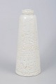 Gunnar Nylund for Rörstrand, chamotte vase with white glaze.Slender conical stoneware vase ...