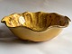 Ceramic bowl with wavy edge. Manufactured at the Kähler factory in Næstved in the 1930s. Covered ...