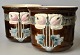 Pair of Jugend faience flower pots, circa 1900. Germany. Polychrome decoration with flowers. H: ...