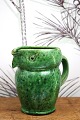 Old "Lillerrød" owl jug in glazed earthenware in fine green glaze with fine patina...