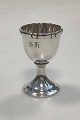 Altar Cup/ Egg Cup in SilverEngraved with S. H. in Gothic letters.Weight 41 g / 1.40 ...