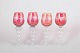 Set of four Bohemian red wine glasses.Red tinted crystal glasses with cut and etched ...