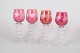 Set of four Bohemian red wine glasses.Red tinted crystal glasses with cut and etched ...