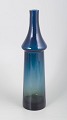 Göran Wärff for Pukeberg, art glass carafe model “Tropico”.Tall art glass carafe in blue-toned ...