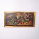 Decorative print featuring a floral motif, presented in a classic gilt frame. The composition ...