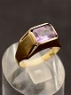 14 carat gold ring with pink colored stone