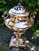 Danish water machine, 19th century. On 4 ball feet. With brass tap. Wooden handle and lid knob. ...
