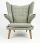 Wegner teddy bear chair with teak nails and oak legs. Needs reupholstering, we offer ...