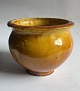 Small jar covered in yellow glaze from the Kähler factory. Made in the 1920s. As can be seen ...