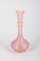Murano vase.Elegant hand-blown glass vase from Murano executed in pink glass with a twisted ...