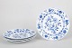Meissen Blue Onion, set of four dinner plates.Hand-painted porcelain dinner plates in the ...