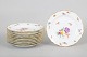 Meissen, Saxon Flower, set of ten side plates.Elegant set consisting of ten hand-painted ...