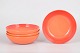 Le Creuset, set of four bowls.Set of four bowls in glazed stoneware with a classic orange ...