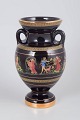 Greek porcelain vase with 24 karat gold decoration.Classic amphora-shaped vase in black glazed ...