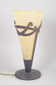 Art deco table lamp.Decorative table lamp in art deco style made of metal and frosted glass ...