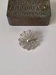 Filigree brooch in sterling silver. Stamped 925s. Diameter 3.5 m. Weight 5.17 grams.