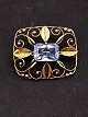 14 carat gold brooch with aquamarine
