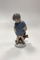 Royal Copenhagen Figurine of Boy with Teddy Bear No. 3468. Designed by Ida Bonfils. 4th ...