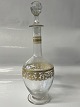 Decanter from the 1920s. Probably from Austria.Height with stopper: 25 cm.Neat and well ...