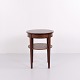 Round side table crafted in mahogany by a Danish cabinetmaker around the 1920s. The table ...