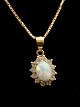 14 carat gold pendant with opal