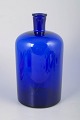 Scandinavian art glass bottle in blue glass.Hand-blown bottle in heavy cobalt blue glass with ...