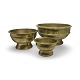 Traditional Javanese brass bowl with foot (often referred to as a bokor or ceremonial betel ...