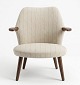 Beautiful armchair by Kurt Olsen with well-shaped teak armrests. Produced by Glostrup ...