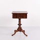Pedestal table crafted in hand-polished mahogany dating from around 1860. The table features a ...