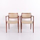 Pair of Model 65 armchairs designed by N.O. Møller and manufactured by J.L. Møllers Møbelfabrik. ...