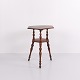 Mahogany side table with a lower shelf and turned round legs, dating from the 1920s. Suitable as ...