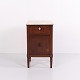 Mahogany bedside table with a marble top, one drawer, and one cupboard door. Dating from the ...