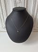 Necklace and pendant in 9 kt gold adorned with a brilliant-cut diamond. Hallmarked 375. Length ...