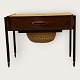Sewing table in rosewood veneer, dark wood legs and with wheels, Dimensions: HxWxD 51cm x 66cm x ...