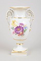 Meissen, hand-painted vase.Elegant baluster vase with twin decorative handles, crafted in ...